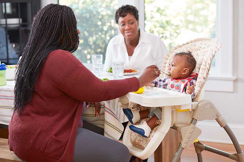 Mom feeding child